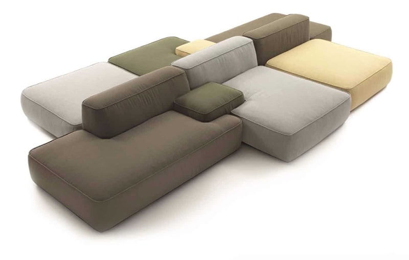 A couch with many different colors and shapes.