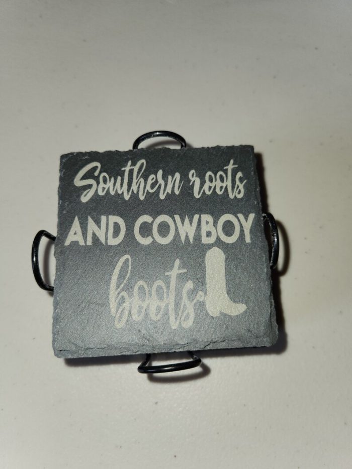 A square slate with the words southern roots and cowboy boots written on it.
