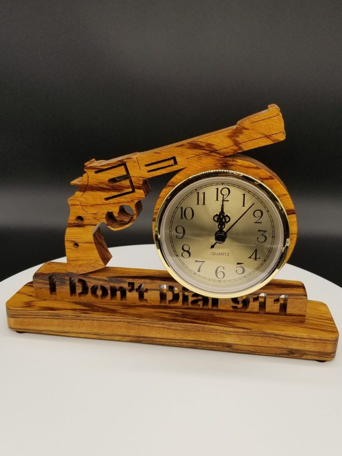 A wooden clock with the words " i don 't dial 9 1 4 ".