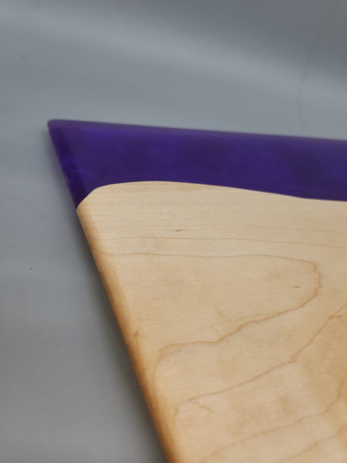 A close up of the edge of a cutting board