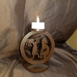 A candle holder with a picture of two animals.