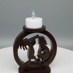 A candle holder with an image of two people.