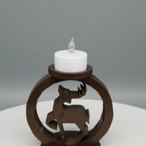 A candle holder with an animal on it